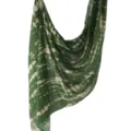 Green printed scarf detail showing soft fabric texture, abstract ink pattern and elegant drape. - 100