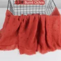 Solid color lightweight cotton linen scarf with crinkled raw edge detail in burnt ochre. - Dark Ochre