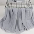 Solid color lightweight cotton linen scarf with crinkled pom-pom and raw edge details. - Gray