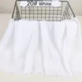 Solid color lightweight cotton linen scarf featuring stylish wrinkled raw edge design. - White