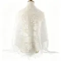 Detailed view of white lace triangular shawl with elegant floral rose pattern and delicate fringe. - White (10)
