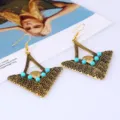 Retro alloy triangle earrings with blue beads, vintage carved ethnic drop jewelry. - Antique Gold
