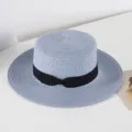 Light blue flat top straw hat with black ribbon bow, stylish summer sun beach hat for women. - M (56-58cm) / Light Blue