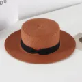 Classic brown flat top straw hat with black ribbon bow, stylish summer sun protection beach hat. - M (56-58cm) / Dark Brown