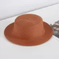 Elegant brown straw boater hat for women, ideal for summer beach sun protection. - One Size / Brown