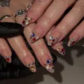 Stunning almond press-on nails featuring elegant nude base and vibrant colorful rhinestones. Perfect! - Nude Colorful Rhinestone 3D Almond Style (JP4290)
