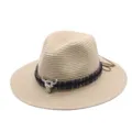 Detailed view of tribal style straw fedora hat with metallic bull skull and woven ribbon. - M (56-58cm) / Beige