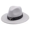 Detailed view of the woven straw fedora hat with brown leather band and bull skull decor. - M (56-58cm) / White