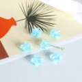 Perline stelle acrilico traslucido azzurro chiaro per creazione gioielli DIY, braccialetto. - Blu