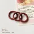 Brauner Legierungs-Federring Nahaufnahme, 25mm Außen- und 17mm Innengröße für DIY - Braun