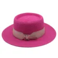 Detailed view of the stylish hot pink flat top straw hat featuring a chic light pink leather belt strap. - M (56-58cm) / Rose Red