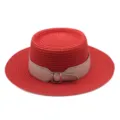 Detailed shot of the red flat top straw hat with a stylish leather belt and metal buckle. - M (56-58cm) / Red