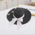 Women wide brim straw hat summer sun protection beach hat with floral ribbon bow. - M (56-58cm) / Black