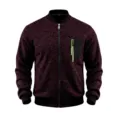 Close-up detail of the men's knit bomber jacket with contrast zipper chest pocket and ribbed hem. - Burgundy