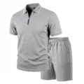 Detailed view of the gray textured short-sleeve polo shirt and shorts set with zipper. - Light Gray