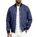 Close-up detail of the men's blue suede bomber jacket showing zipper pocket and buttons - S / Tops / Navy Blue