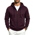 Close-up detail of men's fleece-lined zip hoodie featuring tactical sleeve pockets and hood. - S / Tops / Burgundy