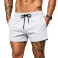Close-up detail of white mesh athletic shorts for men with black adjustable drawstring. - S / White