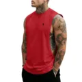 Detail view of the red sleeveless gym tank top, featuring loose fit and chest print design. - S / Tops / Red