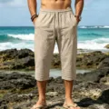 Casual men's cropped shorts featuring a drawstring waist and stylish pleated cuff details. - S / Light Khaki