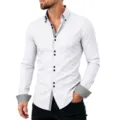 Primo piano della camicia elegante bianca a maniche lunghe con polsini e colletto fantasia. - Taglia S / Top / Bianco