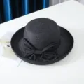 Chapeau de paille noir avec nœud élégant pour les vacances d'été et la protection solaire. - M (56-58cm) / Noir