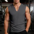 Men's deep gray V-neck athletic tank top detail view, breathable quick-dry fitness apparel. - Iron Gray