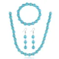 Blaues Kunstperlen Schmuckset mit Strass Abstandhaltern, Halskette, Armband und Ohrringen. - Blau