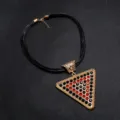 Exaggerated leather cord necklace featuring a large rhinestone triangle pendant and pearl accents for women. - Black+Red