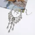 Collar gótico multicapa de calavera y huesos con pendientes de cruz, set de joyería. - Juego 1 / Plateado
