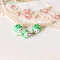 Perline smiley in vetro verde con pois bianchi, 11x14mm perla sfusa per gioielli fai da te. - Stile 05 Faccina Verde Sorridente (D1222-29) / 1 Pezzo/Confezione (11x14mm) / Verde