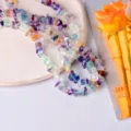 Vista dettagliata di una collana di perle di pietra di cristallo per accessori DIY. - Confezione da 10 Pezzi / Verde trasparente