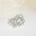 Close-up detail of silver metal jump rings, size 0.4x3mm, ideal for DIY jewelry making. - 3mm (50 Pieces/Pack) / Platinum