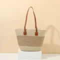 Close up of the woven straw tote bag featuring brown leather shoulder straps and striped detail. - Beige Khaki Stripe (Single Bag)