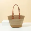 Close-up detail of the straw woven beach tote bag featuring brown leather handles and stripes. - Khaki Beige Stripe (Single Bag)