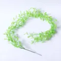 Artificial green willow vine leaf garland for indoor home wall wedding decor detail view - Green