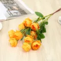 Détail de bouquet de fleurs de pivoine jaune artificielle, bel arrangement de fleurs pour déco. - Orange