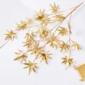 Golden artificial maple leaves branch for home decor, wedding and festival party arrangement. - Maple Leaf / Gold