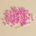 Vista dettagliata di perline rosa gelatina da 3mm per bracciali e collane fai da te. - Stile 01
