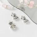 Detailed shot of silver alloy bear charms for DIY handmade jewelry bracelets and necklaces. - Teddy Bear / Silver
