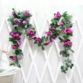 Detailed view of artificial rose flower vine with purple silk roses and lush green leaves. - 16 Heads Rose Purple