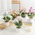 Artificial daisy potted plant for indoor home decoration, realistic flowers with white pot. - Jump Orchid Daisy / Orange