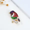 Exquisite vintage enamel bird brooch featuring sparkling rhinestones and colorful details for women. - Magpie Design / 4.12x2.7cm / Blue