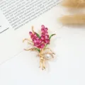 Elegant crystal floral brooch detailed with pink rhinestones and pearl for women detail view - Wheat Ear Style 1 / 6.2*4.8cm