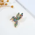 Close-up detail of the vintage rhinestone bird brooch featuring colorful crystal design. - Hummingbird Style 1 (3283093)