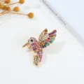 Rhinestone hummingbird brooch detail showing multi-colored crystals and gold-tone finish. - Hummingbird Style 2 (3283093)