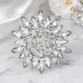 Detailed shot of the luxury crystal magnolia flower brooch featuring sparkling rhinestones. - 1 Piece/Pack (7x7cm) / Silver Base White