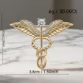 Broche vintage de ala de ángel dorada con pedrería moda para traje abrigo 3.2x3.8cm - Dorado