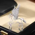 Exquisite winged horse brooch detail, micro-set cubic zirconia, elegant jewelry box scene closeup - Silver Base / 4.8*4cm / Silver