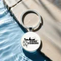 Fishing enthusiast keychain with round glass cabochon pendant, detailed close-up shot. - Style 9